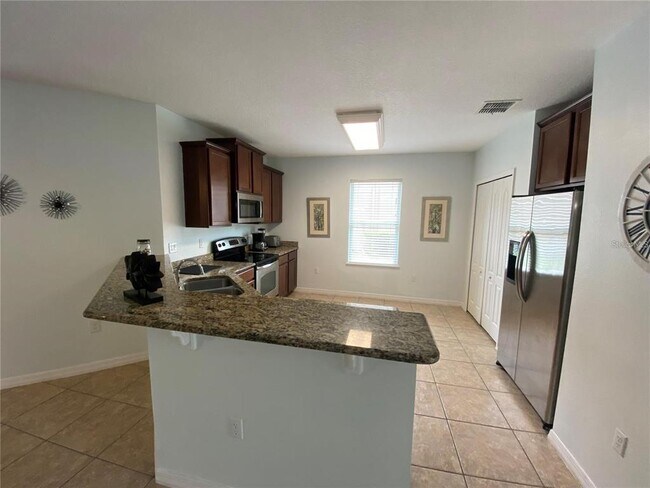 Building Photo - 9027 Paolos Pl