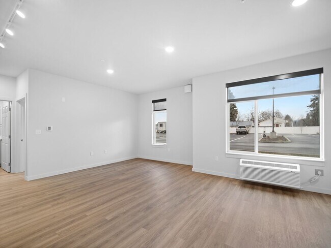 Building Photo - Flats on 4th Apartments