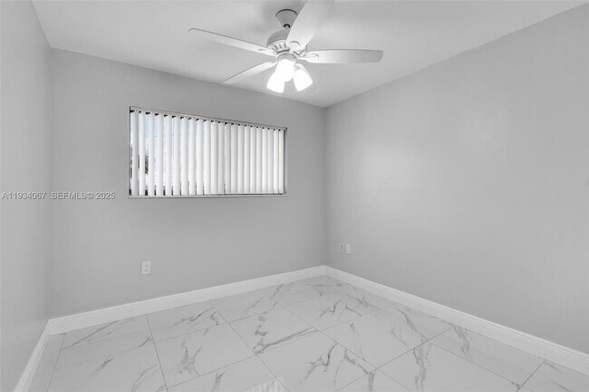 Building Photo - 5061 W 12th Ln