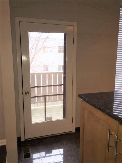 Kitchen private deck door - 5717 Howe St