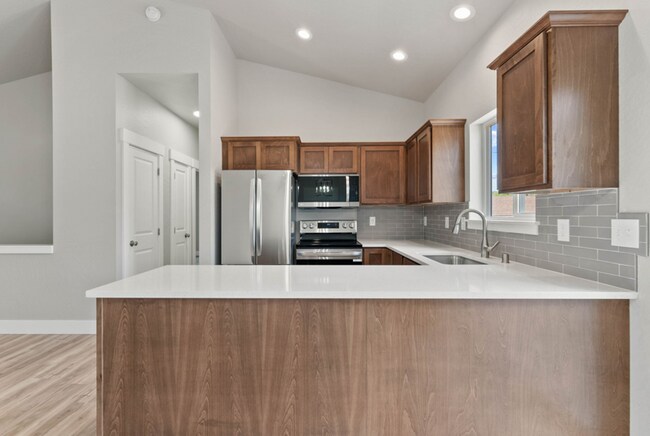 Building Photo - Newly Built 4 Bedroom Duplex With Yard
