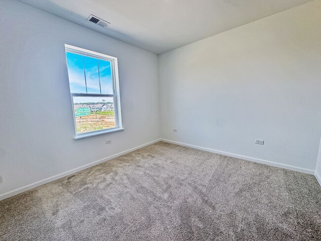Building Photo - Step into modern living with this brand-ne...