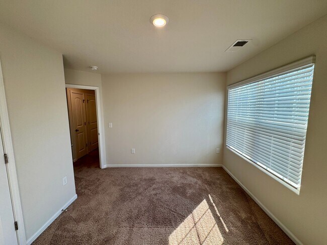 Building Photo - Located in Creedmore Hills a 4BR/2.5BA home with 2 car garage