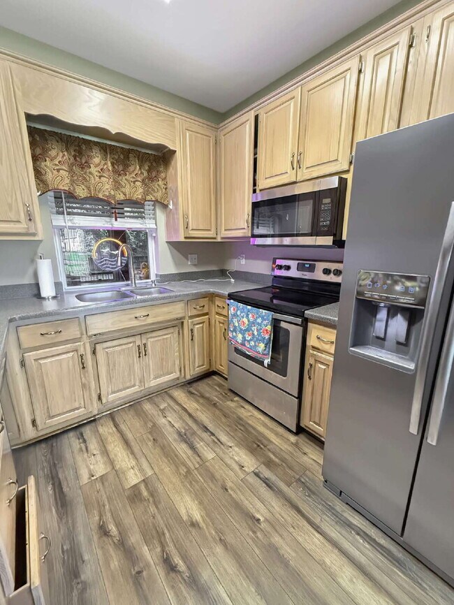 Building Photo - Now $2,395 – Spacious, Established Home with Room to Breathe