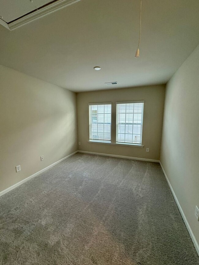 Building Photo - 4BR/2.5BA in Steel Creek's Brightwater Neighborhood