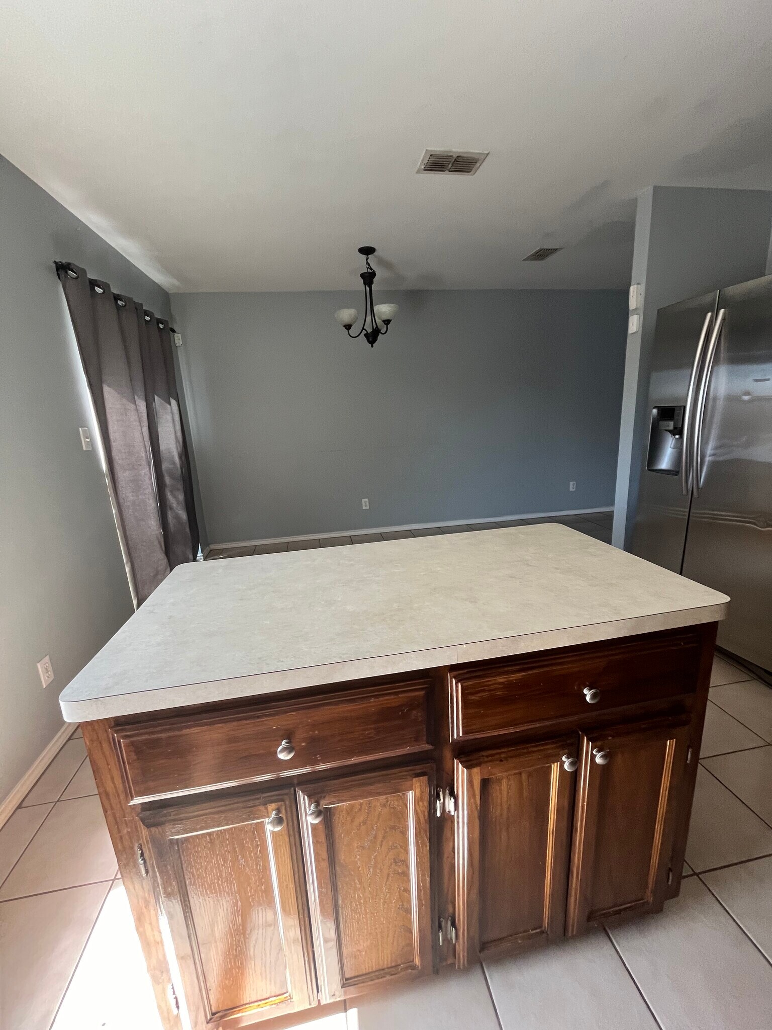 Kitchen overlooking dining area. - 1414 Denver