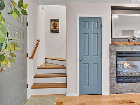 Building Photo - Single-level living at its finest! This co...