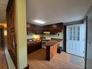 Building Photo - Cozy 2-Bedroom Home with Backyard & Deck