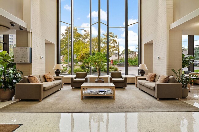 Building Photo - Spacious, and Sunlit 1 BD/1 BA Condo w/Reserved Garage Parking and Utilities Included in Chevy Ch...