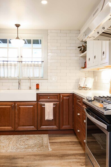 Kitchen with integrated trash enclosure - 2214 Brant St