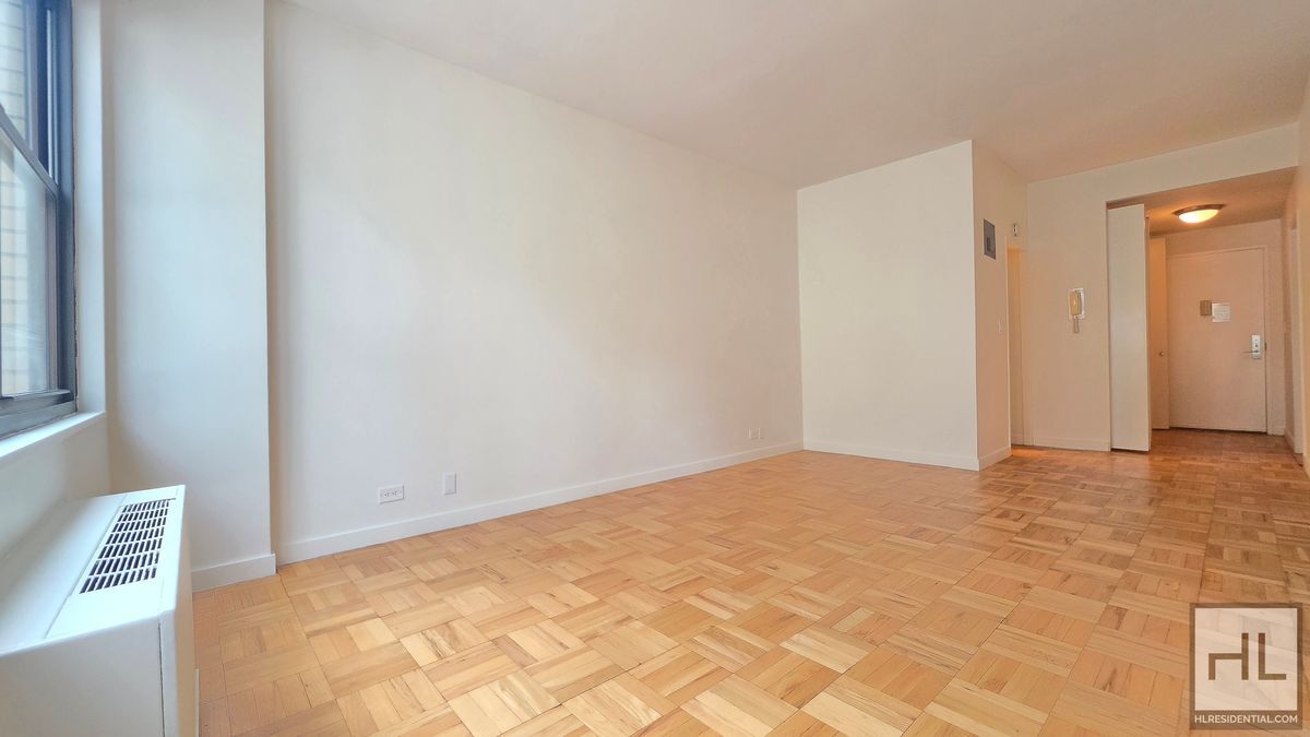 Building Photo - Bright Ninth-Floor Studio with Exceptional Closet Space near the UN