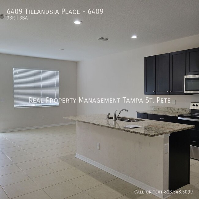 Building Photo - 6409 Tillandsia Pl
