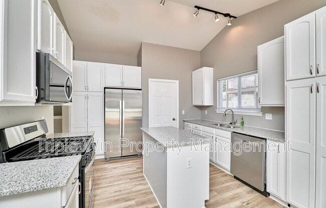 Building Photo - 4927 Triple Tree Ct