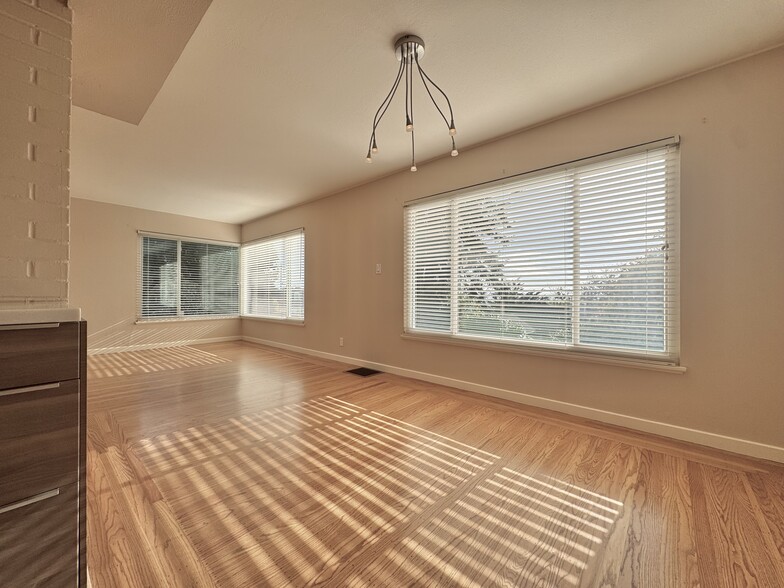 Harmonious flow from main living area to the private slate atrium and fountain garden. - 2403 Mira Vista Dr