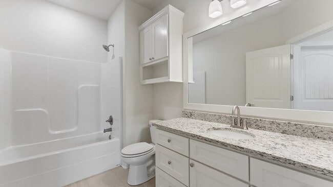Building Photo - "Lovely 4-Bedroom Retreat with Fireplace &...