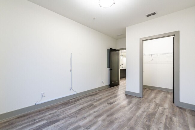 Building Photo - Modern Living Meets Walkable City Charm in...