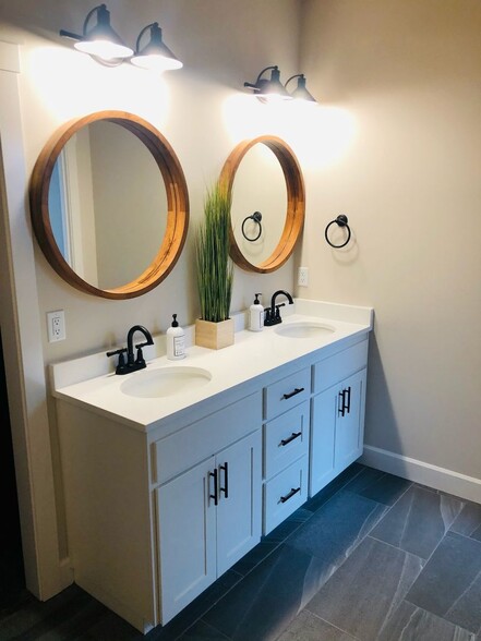 Master bathroom with custom mirrors and upgraded accents - 12048 NE 109th St