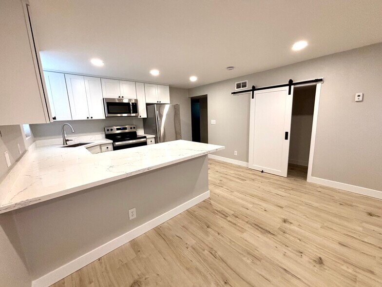 New paint and lighting throughout. Brand new kitchen and counter seating - 2026 Lombard Ave