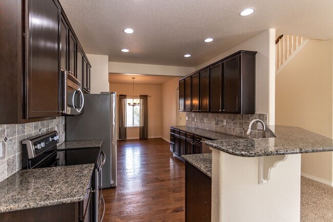 Building Photo - Spacious 5-Bedroom Home with Finished Base...