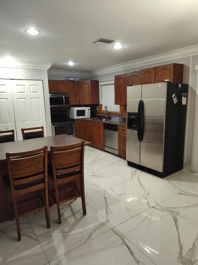 Building Photo - 6790 NW 24th Ct