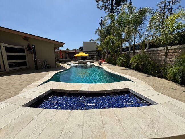 Building Photo - Luxurious Oasis with Resort-Style Pool and...