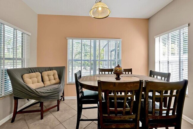 Building Photo - "Stunning 3BR Orlando Home with Private Screened Pool, Spa & Spacious Living Areas"