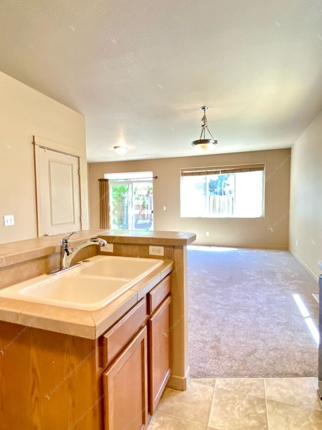 Building Photo - 3  BR home with new flooring in a great NE...