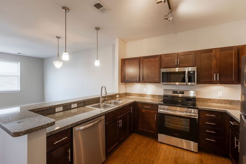 Spacious living room - Pinhook Flats at Aksarben Village