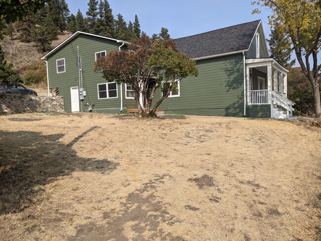 Side yard - 630 W Main St