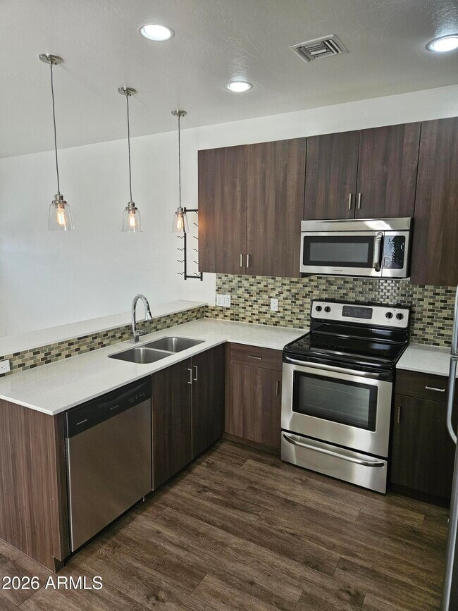 Building Photo - 7981 E Wilshire Dr