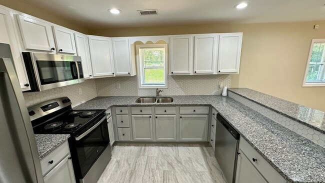 Building Photo - Charming Brand New 1 Bedroom 1 Bath Duplex