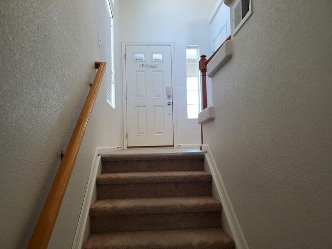 Building Photo - Tri-Level with Primary at top and 2 bedrooms on the lower level.