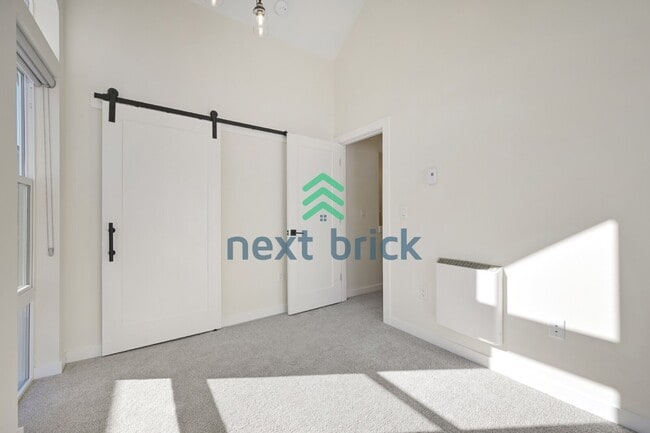 Building Photo - Modern Northwest-Danish Inspired Townhome with Standalone Cottage Feel in Seattle’s Central District