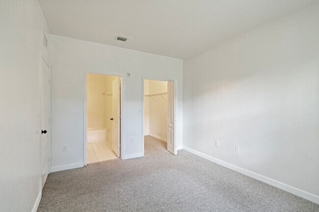 Building Photo - 2-bath condo on the 2nd floor with a newly...
