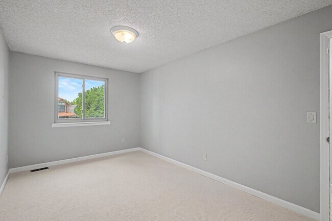 Building Photo - Updated 4BR Corner Lot Home with Finished Basement & 2-Car Garage
