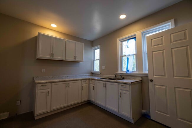 Building Photo - Stylish, Updated & Ready to Call Home