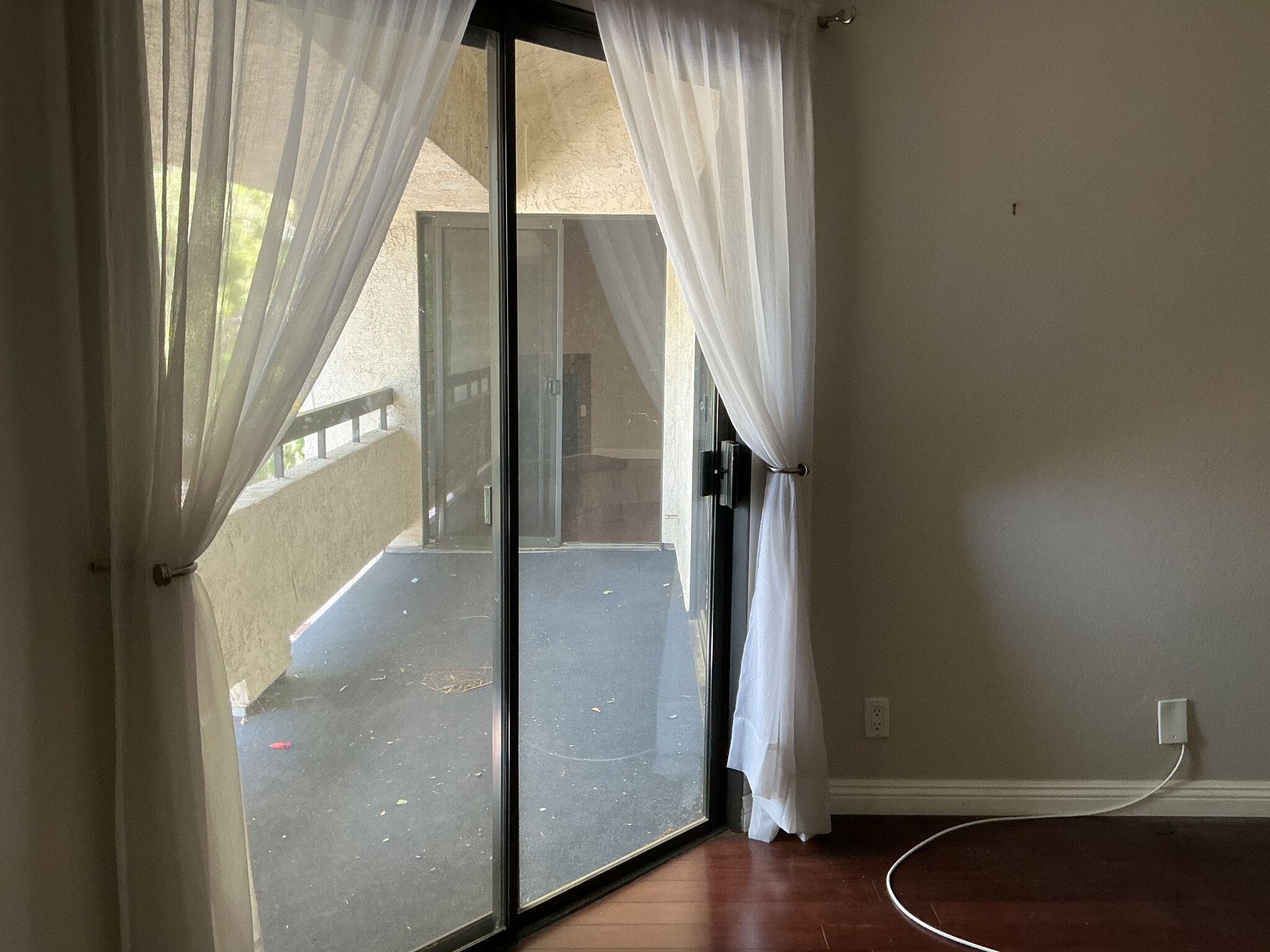 Expansive balcony with access from both bedrooms and living room - 21650 Burbank Blvd