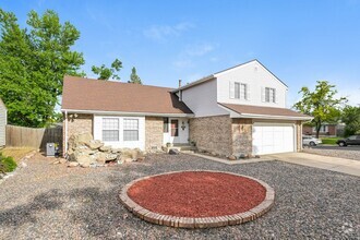 Building Photo - Spacious 4 Bed/ 2.5 Bath Home with Finishe...