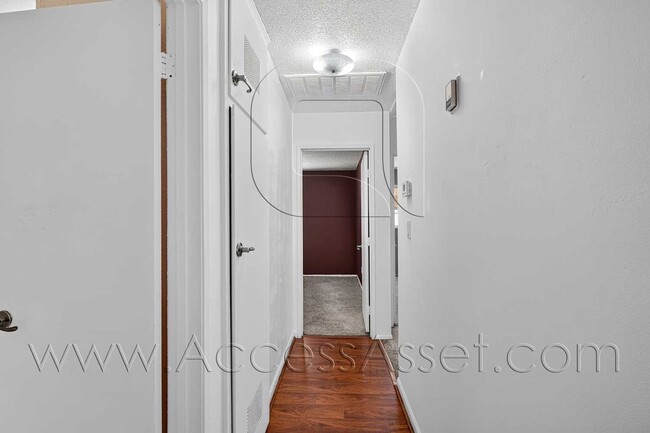 Building Photo - Charming 4 Bedroom Home with Private Yard & Garage Parking