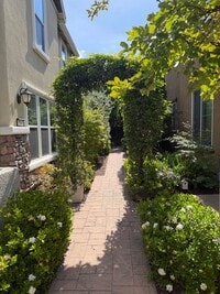 Building Photo - Solar Home with EV Garage Charging. 4 Bedroom Home with Downstairs Bedroom and Full Bathroom.