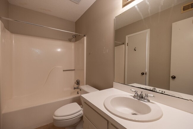 Building Photo - ONE FREE MONTH ON 13 MONTH LEASE! Welcome to this charming 3-bedroom, 2-bath condo located in the...