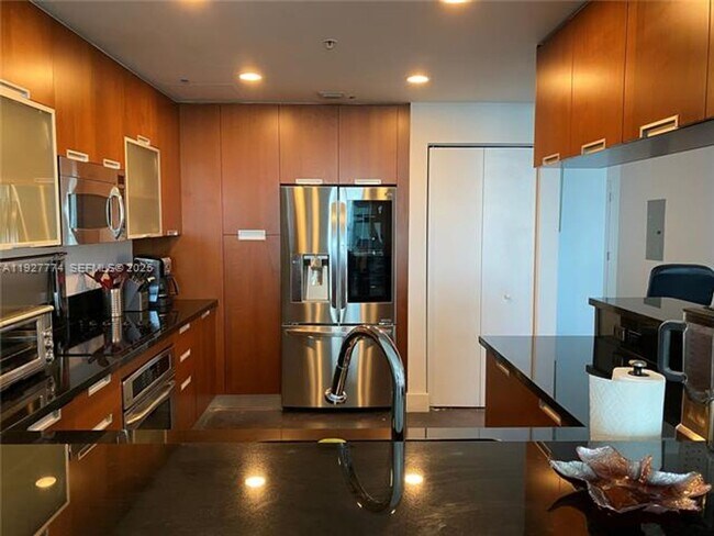 Building Photo - 7901 Hispanola Ave