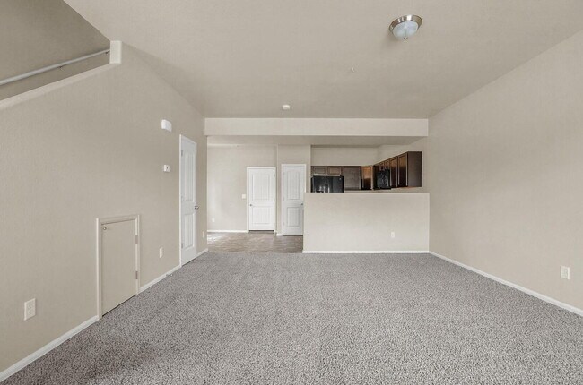 Building Photo - Modern Townhome with Central A/C, 2-Car Ga...
