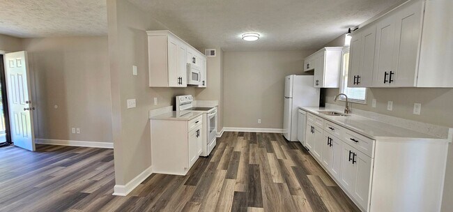 Building Photo - Get ½ Month Free—Apply & Get Approved! 3-B...
