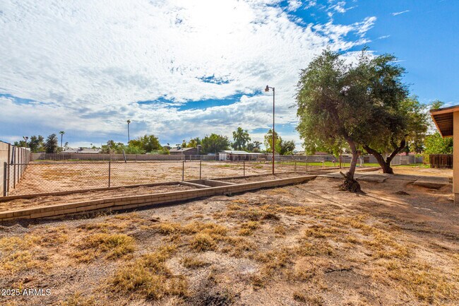 Building Photo - 5031 E Pershing Ave