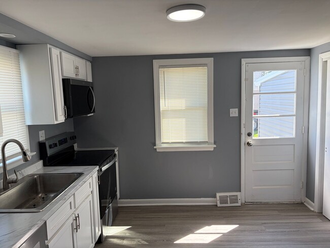 Building Photo - Fully Renovated 2BR/1.5BA Twin Home on Corner Lot-Move in Ready