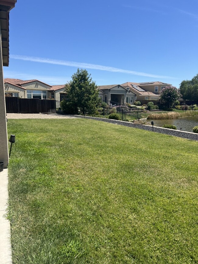 Building Photo - Stunning 4-Bed Lake View Home with Hardwood Floors