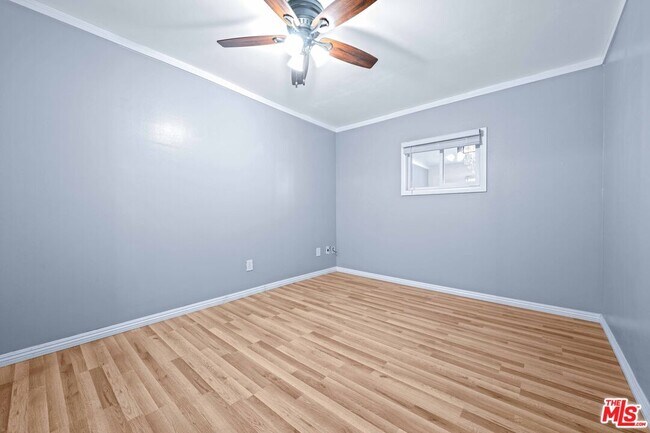 Building Photo - 12801 Moorpark St