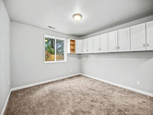 Building Photo - Spacious 4-Bedroom Lacey Home with A/C, Basement Bonus Space & Wetlands Privacy