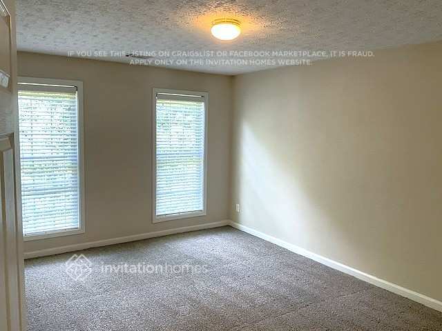 Building Photo - 6658 Point of Woods Dr